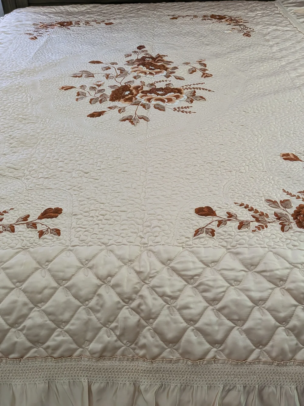 Elegant Cream Quilted Bedspread with Embroidered Rust Floral Accents